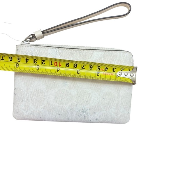 Coach white snowflake signature Wristlet bag